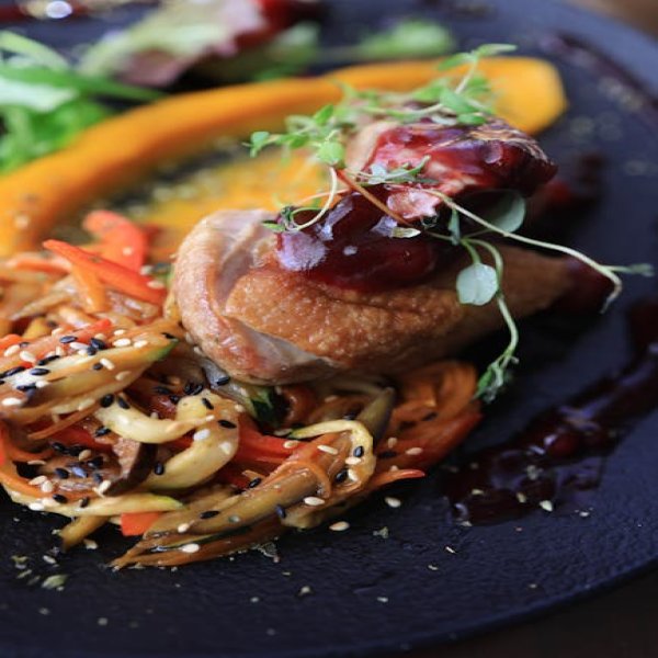 Honey-Harissa Glazed Duck Breast with Fig-Shallot Compote & Pistachio-Farro Pilaf