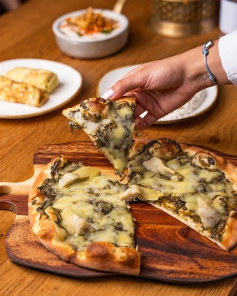 Copycat Cheesecake Factory Warm Spinach Artichoke Dip